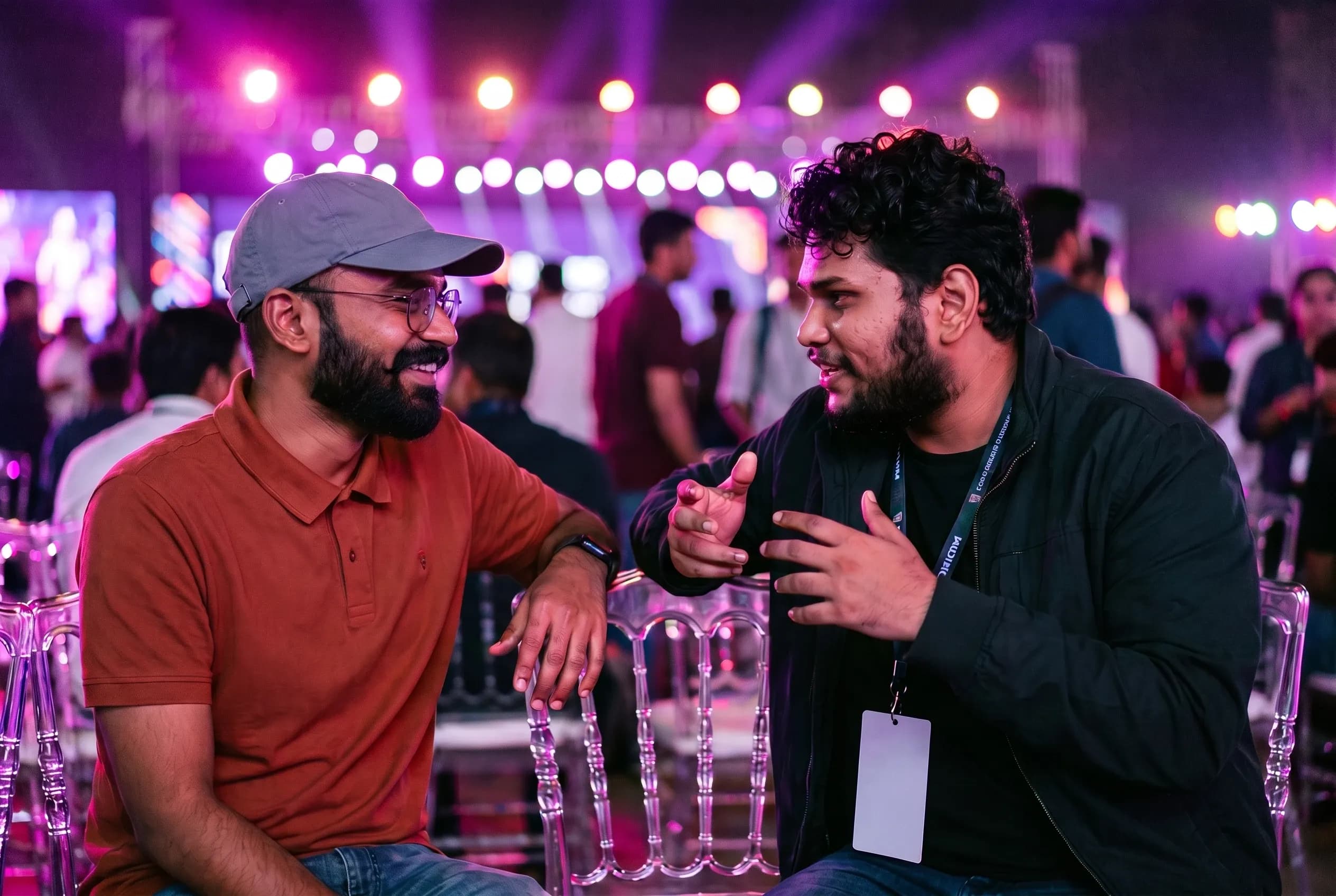 Two DigiIQ team members catching up at a tech conference evening